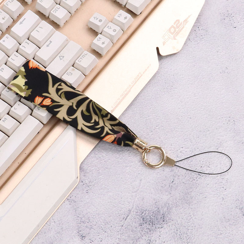 Cordón de tela para celular o multiusos crisantemo negro