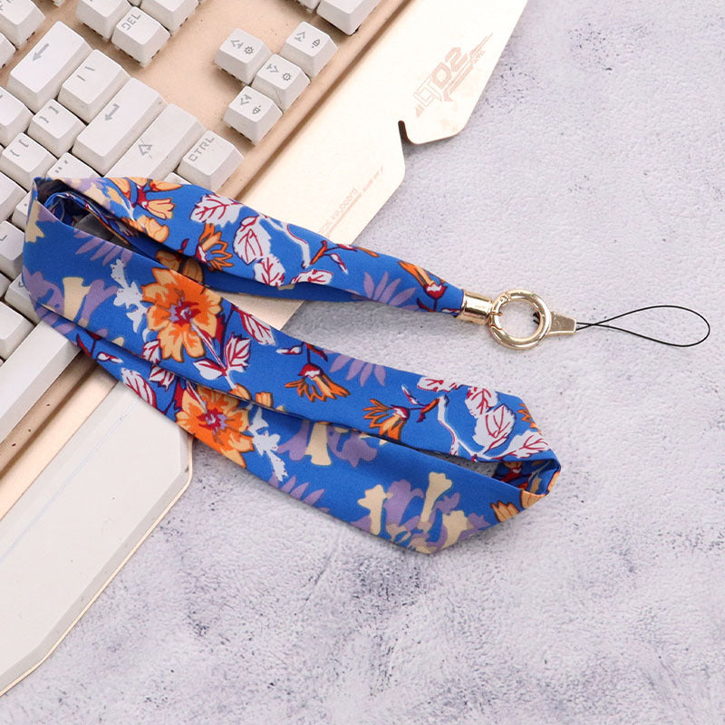 Cordón de tela para celular o multiusos crisantemo azul real