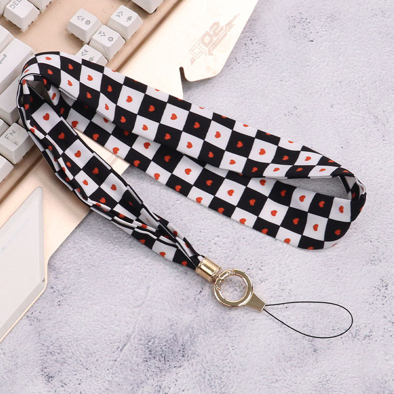 Cordón de tela para celular o multiusos corazon negro