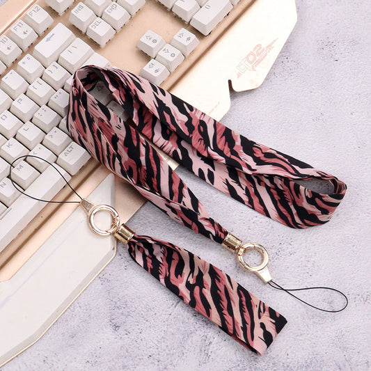 Cordón de tela para celular o multiusos estampado de leopardo rosa