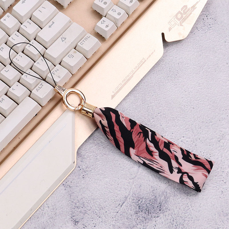 Cordón de tela para celular o multiusos estampado de leopardo rosa