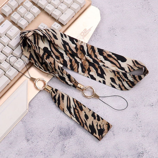 Cordón de tela para celular o multiusos estampado de leopardo beige