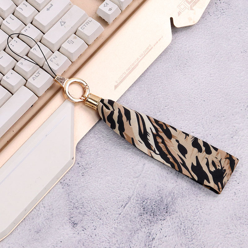 Cordón de tela para celular o multiusos estampado de leopardo beige