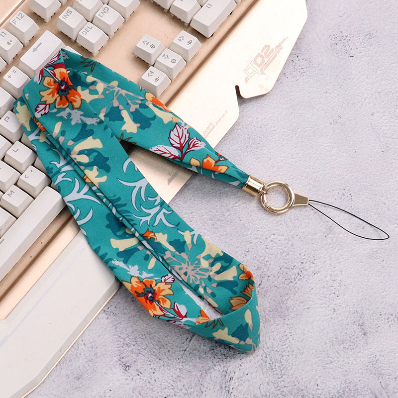 Cordón de tela para celular o multiusos crisantemo verde malaquita